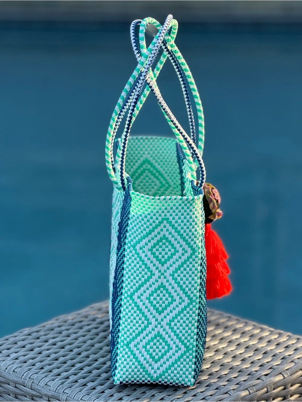 Handwoven Blue & Teal Diamond Tote Bag with Red Tassel Charm